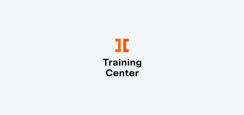 Training Center vertical logo on a light gray backgroundd